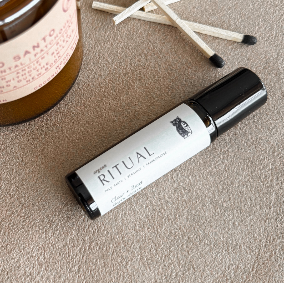 Clarifying aromatherapy roller with organic Palo Santo, Bergamot & Frankincense in jojoba oil. Roll on pulse points to clear your mind and reset.
