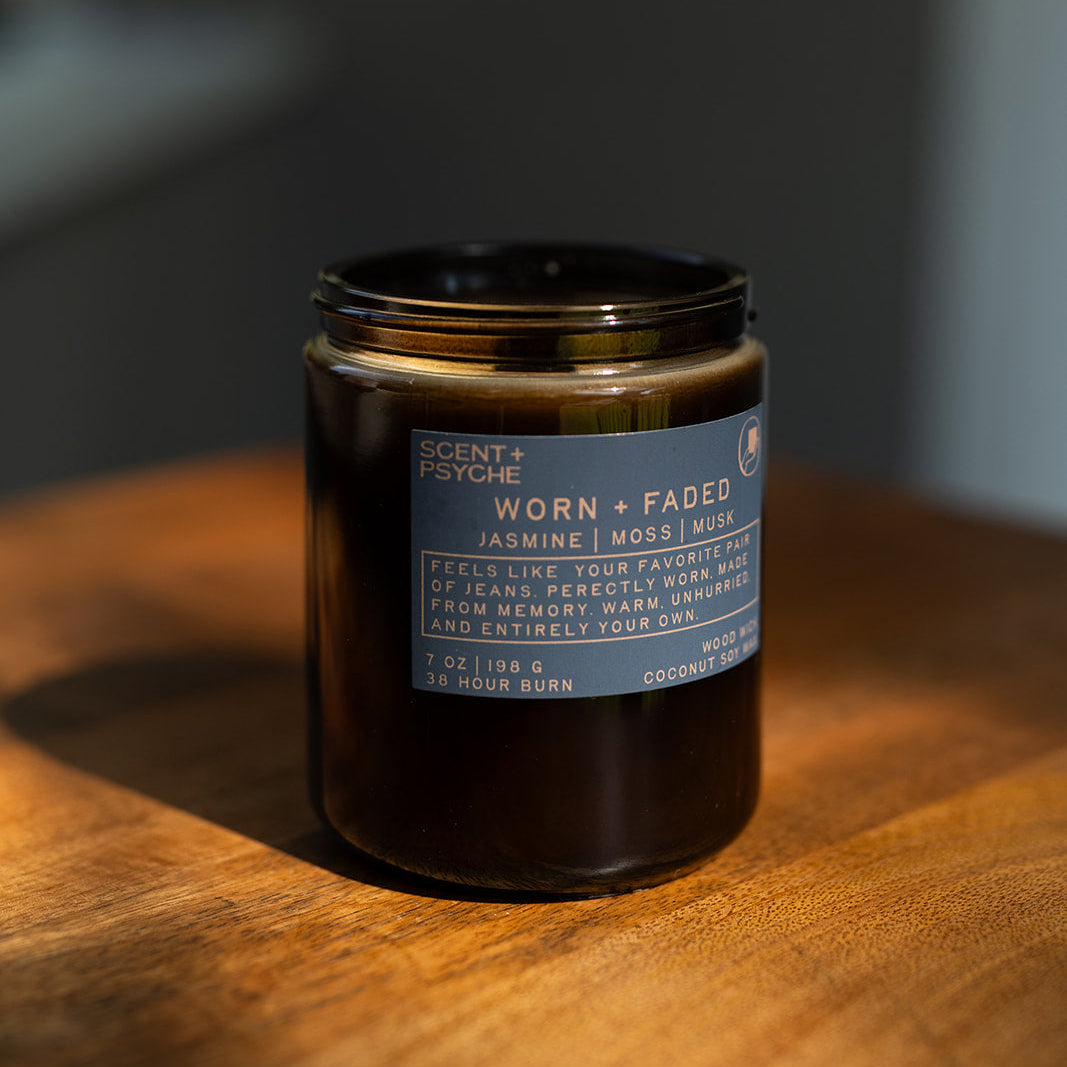 Worn and Faded coconut soy candle in amber jar, soft musk and jasmine home fragrance — Scent & Psyche