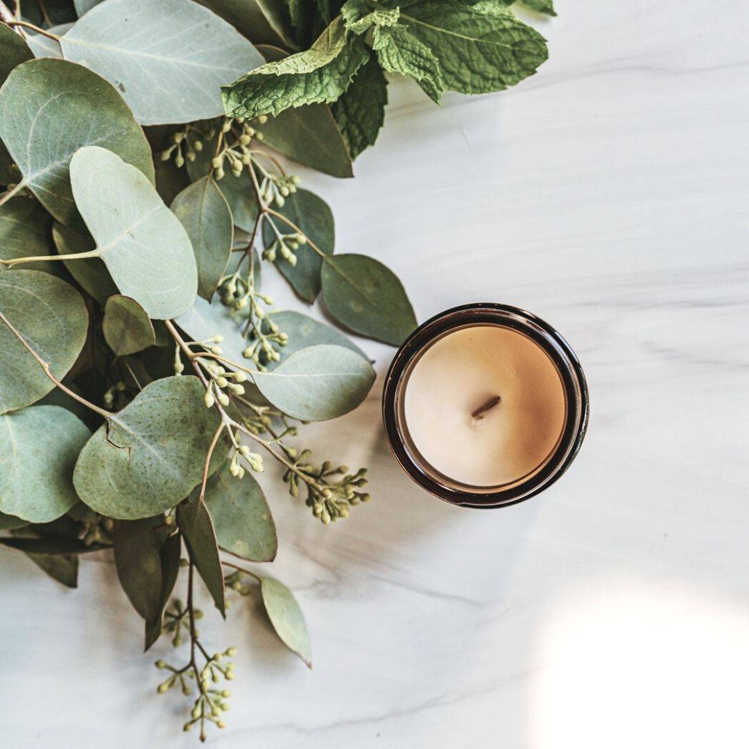Top view of the Purist Scented Candle in a 4oz amber jar, showcasing its smooth coconut soy wax. A stylish addition to any home decor.