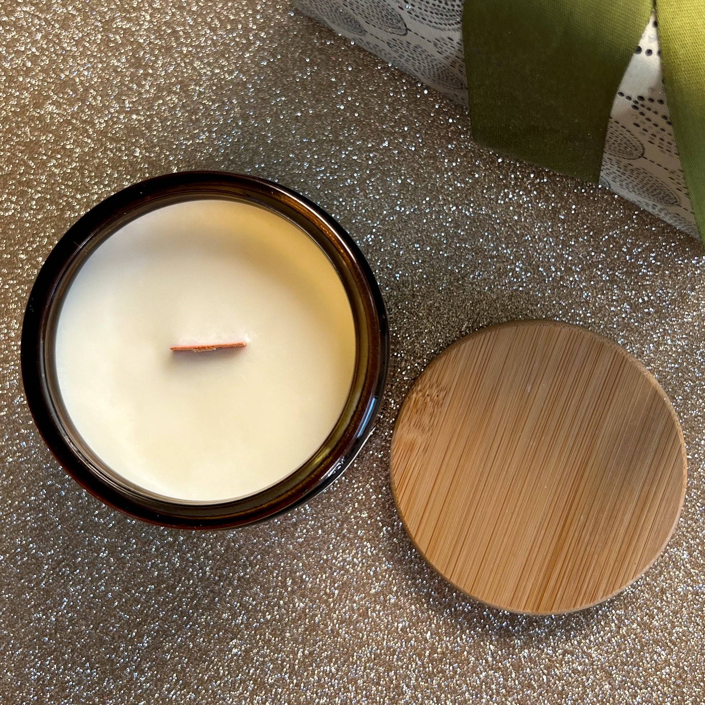 top - Discover the Cheers Scented Candle, a festive holiday candle with black current. anise and amber.  Perfect for holiday celebrations creating a memorable backdrop.
