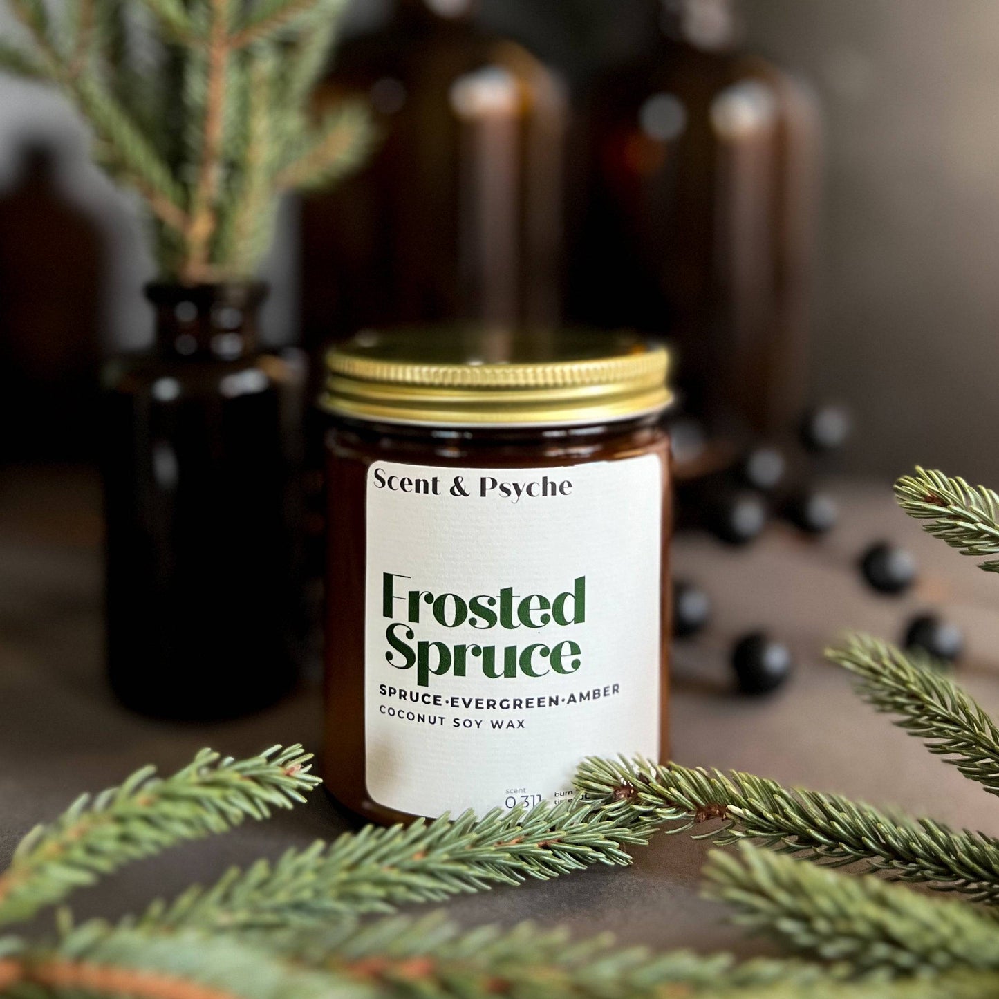 Frosted Spruce is a holiday scented candle with notes of spruce, moss, and cedar, capturing the fresh scent of a Christmas tree with a rich, woodsy finish.