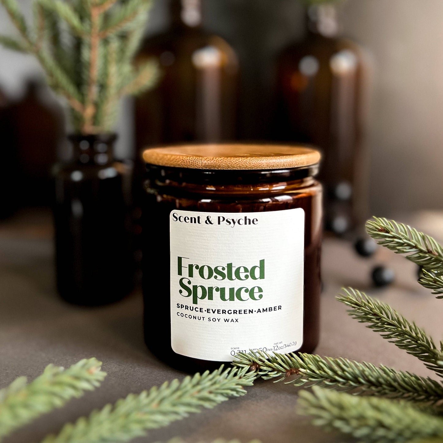 Frosted Spruce is a holiday scented candle with notes of spruce, moss, and cedar, capturing the fresh scent of a Christmas tree with a rich, woodsy finish.
