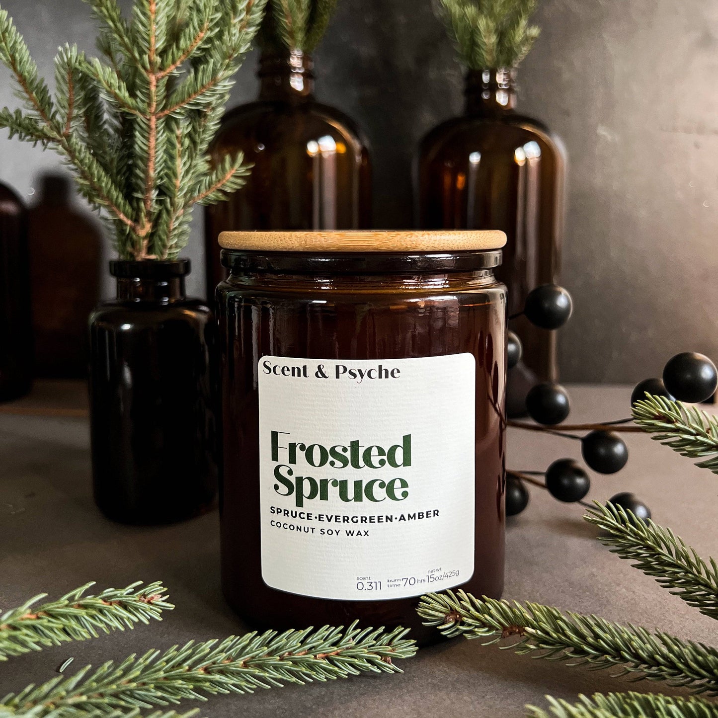 Frosted Spruce is a holiday scented candle with notes of spruce, moss, and cedar, capturing the fresh scent of a Christmas tree with a rich, woodsy finish.
