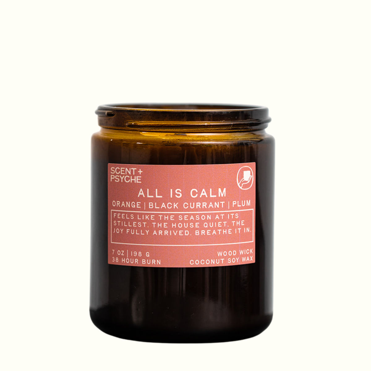 All is Calm 7 oz wood wick candle by Scent + Psyche in an amber glass jar with a pink label