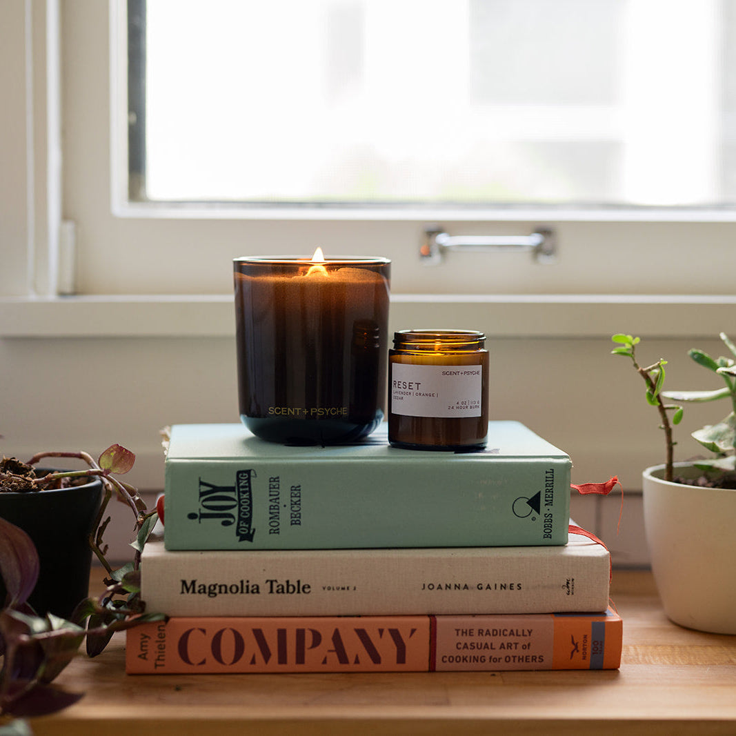 energizing and fresh scents candles on a kitchen counter